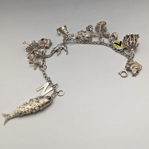 British vintage sterling silver charm bracelet 35g